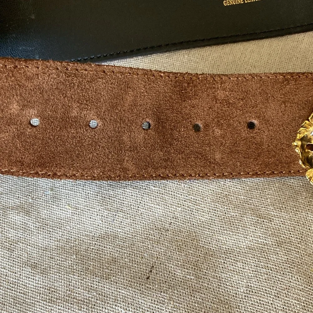 Genuine suede leather belt with one of a kind buckle.
